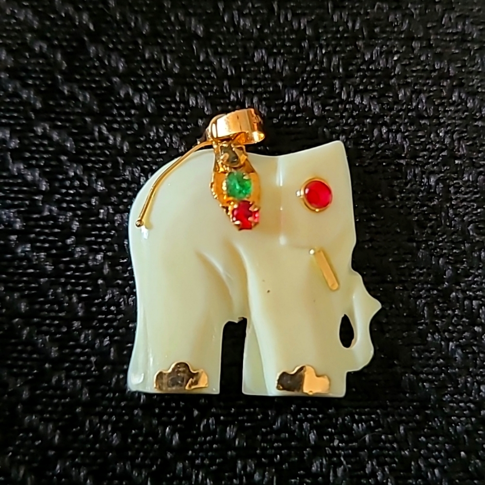 Carved ivory 14k elephant